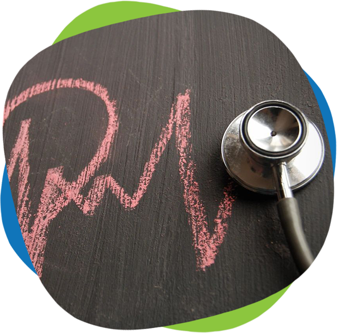 A stethoscope and chalk drawing of an ecg.